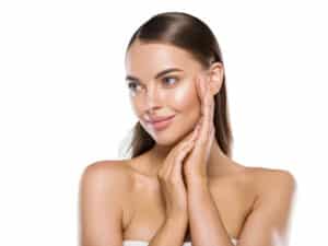 Woman with smooth skin after dermaplaning in Plano, TX