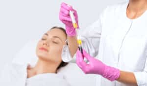 Woman about to get PRP injections in Plano, TX